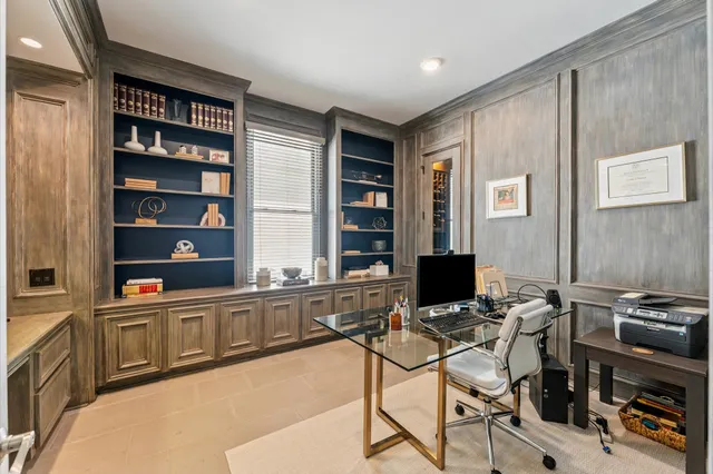 a view of a workspace with furniture