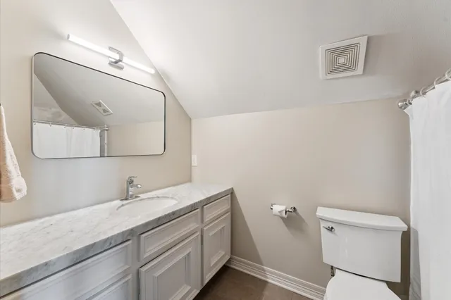 a view of cabinets with washer and dryer