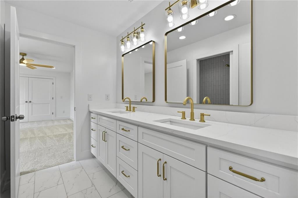 88 Carolyn Path Rockmart, GA 30153 - Photo 35 of 73 a bathroom with a sink and a mirror
