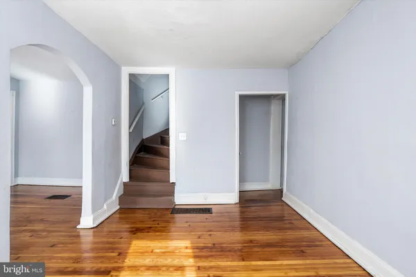 a view of an entryway of wooden floor