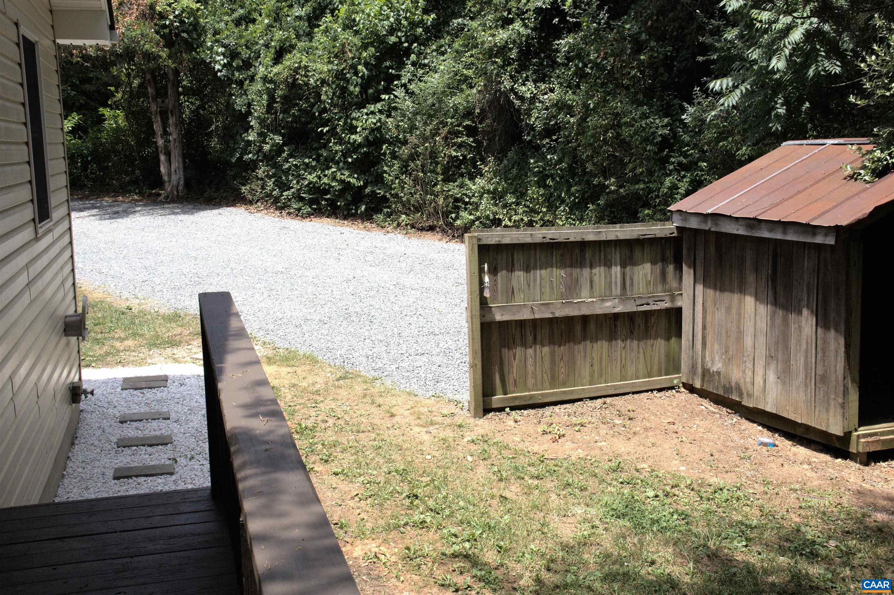 122 Petunia Road Ruckersville, VA 22968 - Photo 12 of 59 a backyard of a house with oven