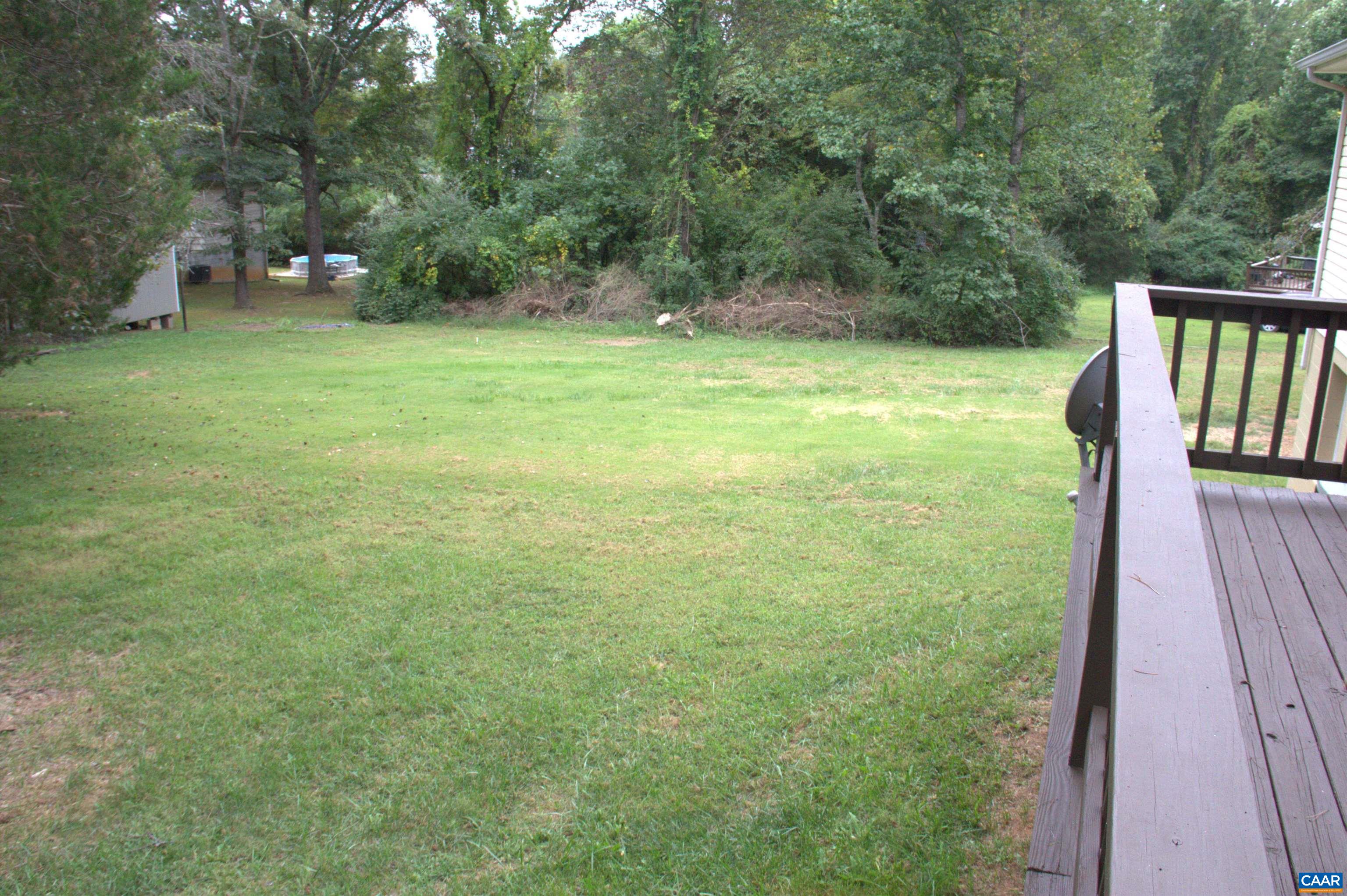122 Petunia Road Ruckersville, VA 22968 - Photo 13 of 59 a view of outdoor space with deck and yard