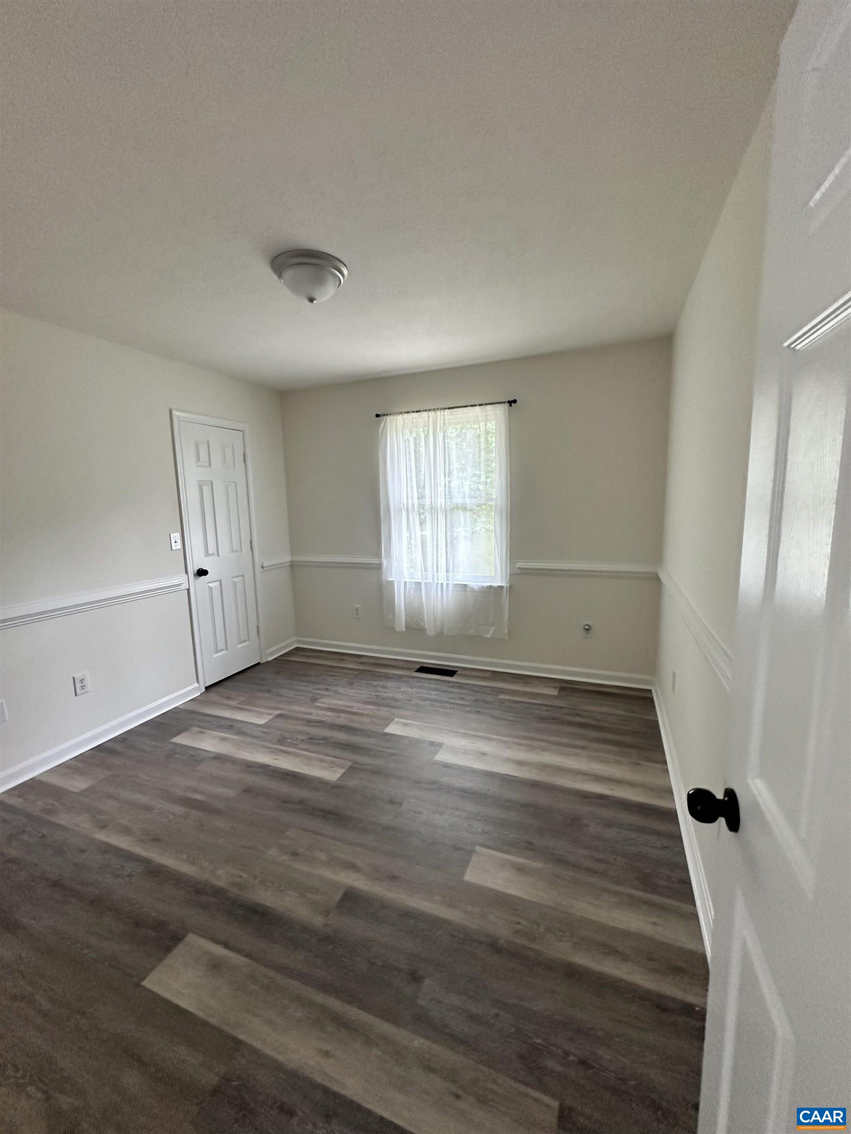 122 Petunia Road Ruckersville, VA 22968 - Photo 24 of 59 an empty room with windows