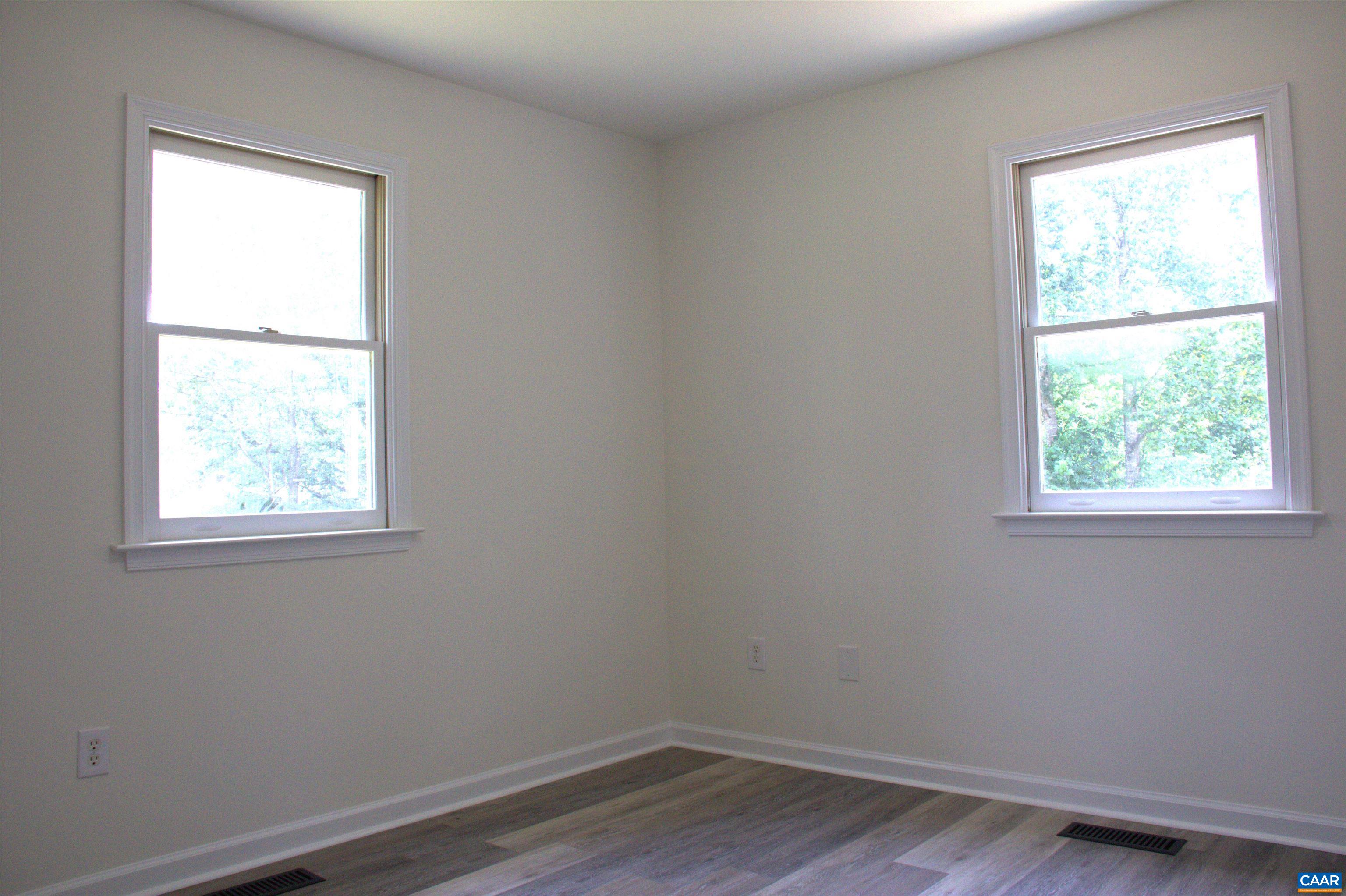 122 Petunia Road Ruckersville, VA 22968 - Photo 35 of 59 an empty room with a window