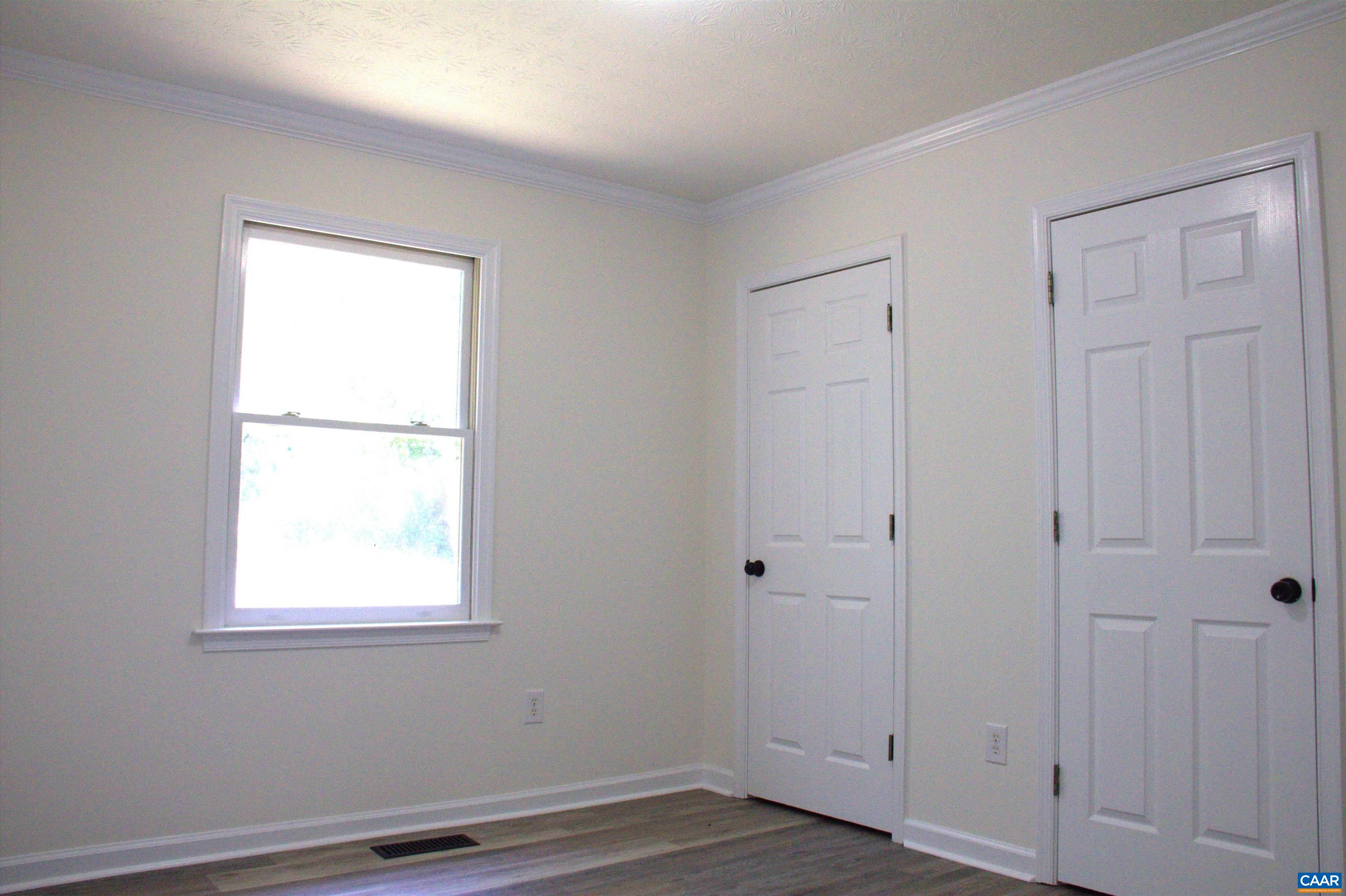 122 Petunia Road Ruckersville, VA 22968 - Photo 38 of 59 a view of an empty room with closet and window