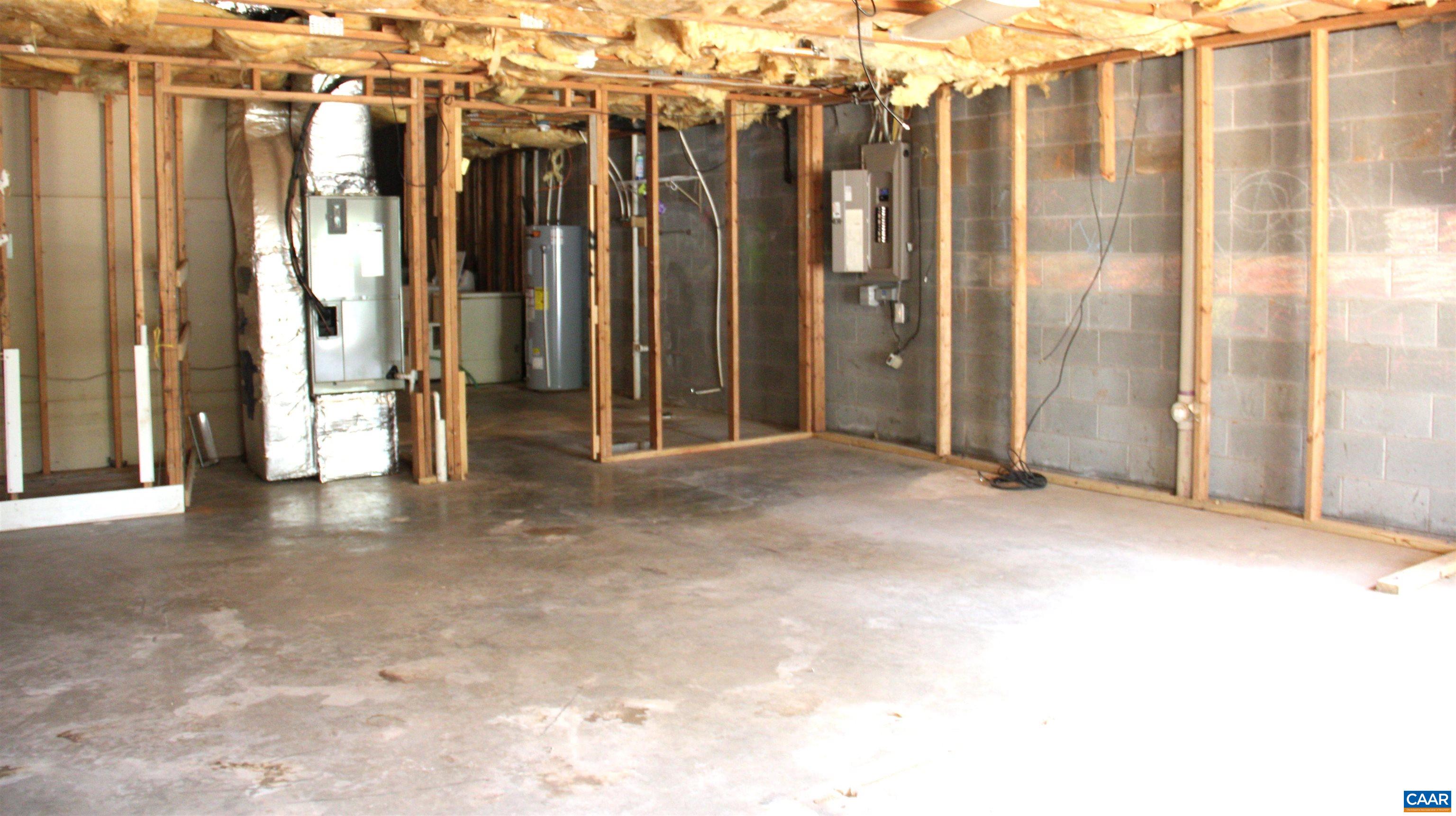 122 Petunia Road Ruckersville, VA 22968 - Photo 46 of 59 a view of a room with large windows
