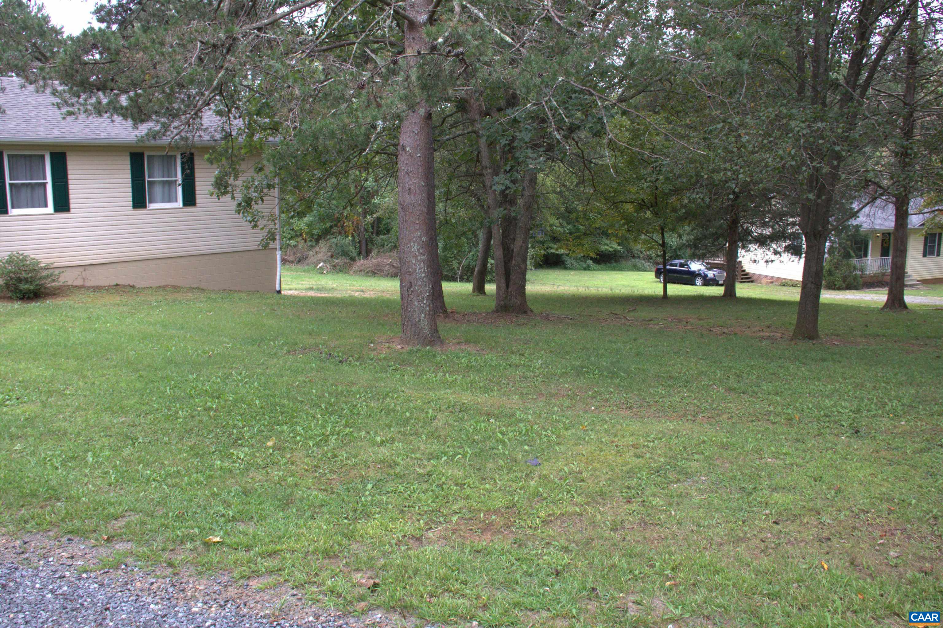 122 Petunia Road Ruckersville, VA 22968 - Photo 49 of 59 a view of a house with a backyard