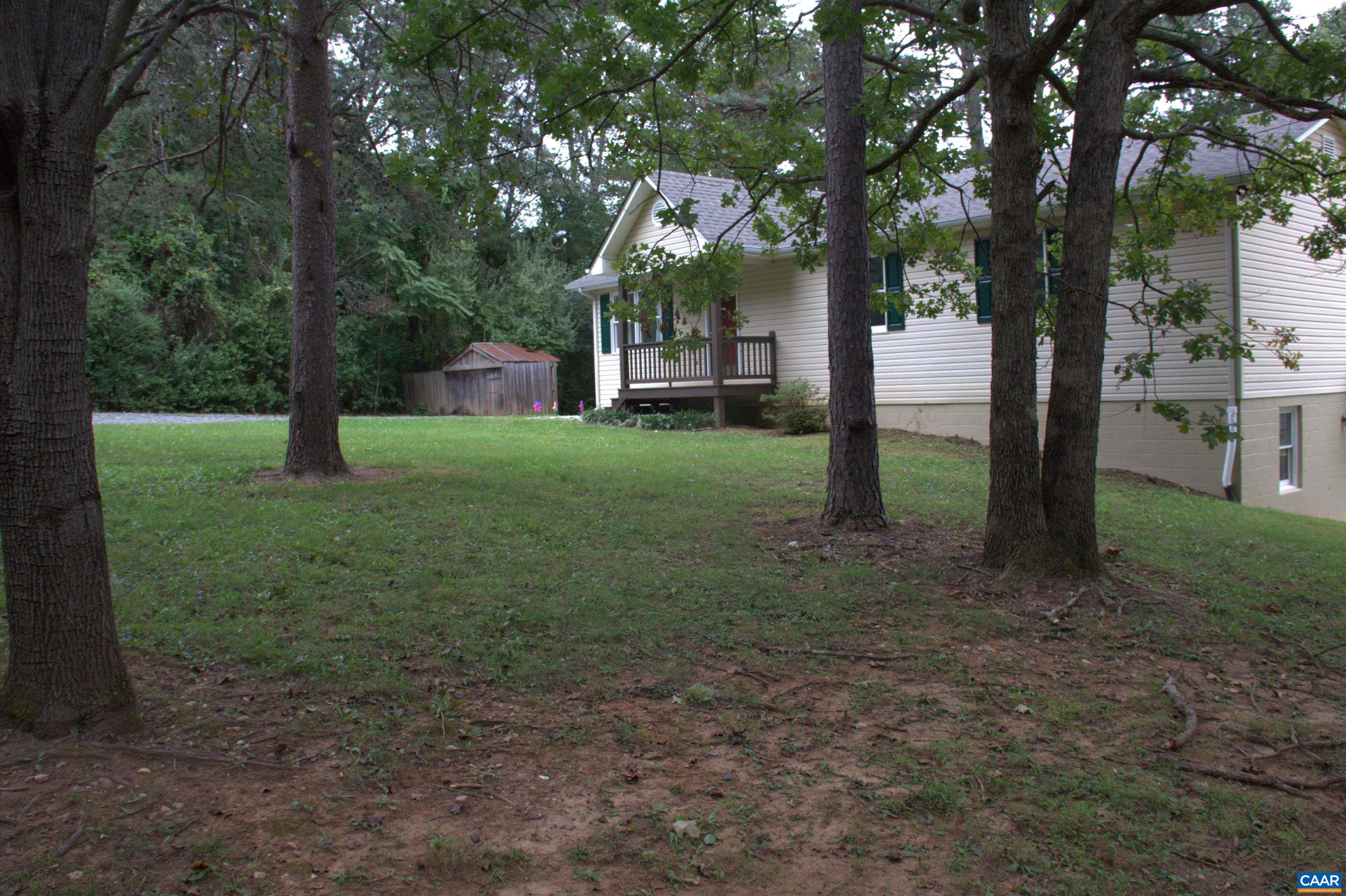 122 Petunia Road Ruckersville, VA 22968 - Photo 54 of 59 a view of a house with a yard
