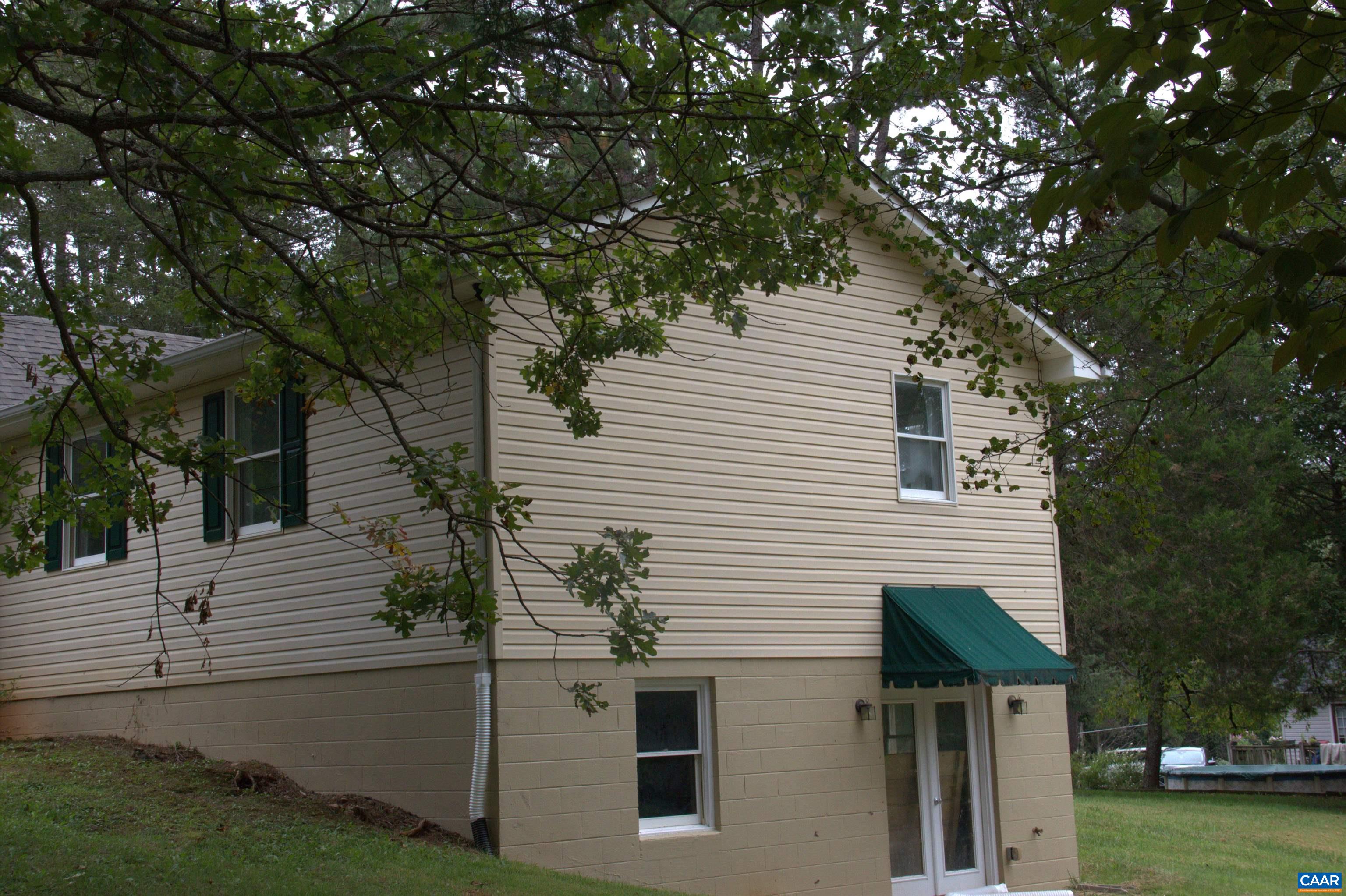 122 Petunia Road Ruckersville, VA 22968 - Photo 8 of 59 a view of a house with a yard