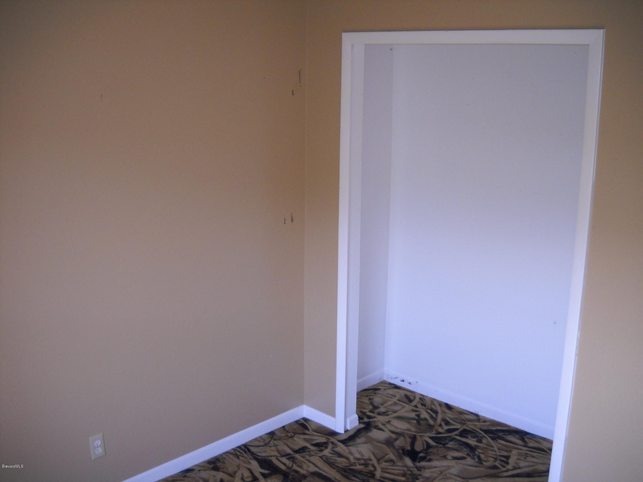 813 Gardener Road Rockledge, FL 32955 - Photo 15 of 21 2nd bedroom closet view