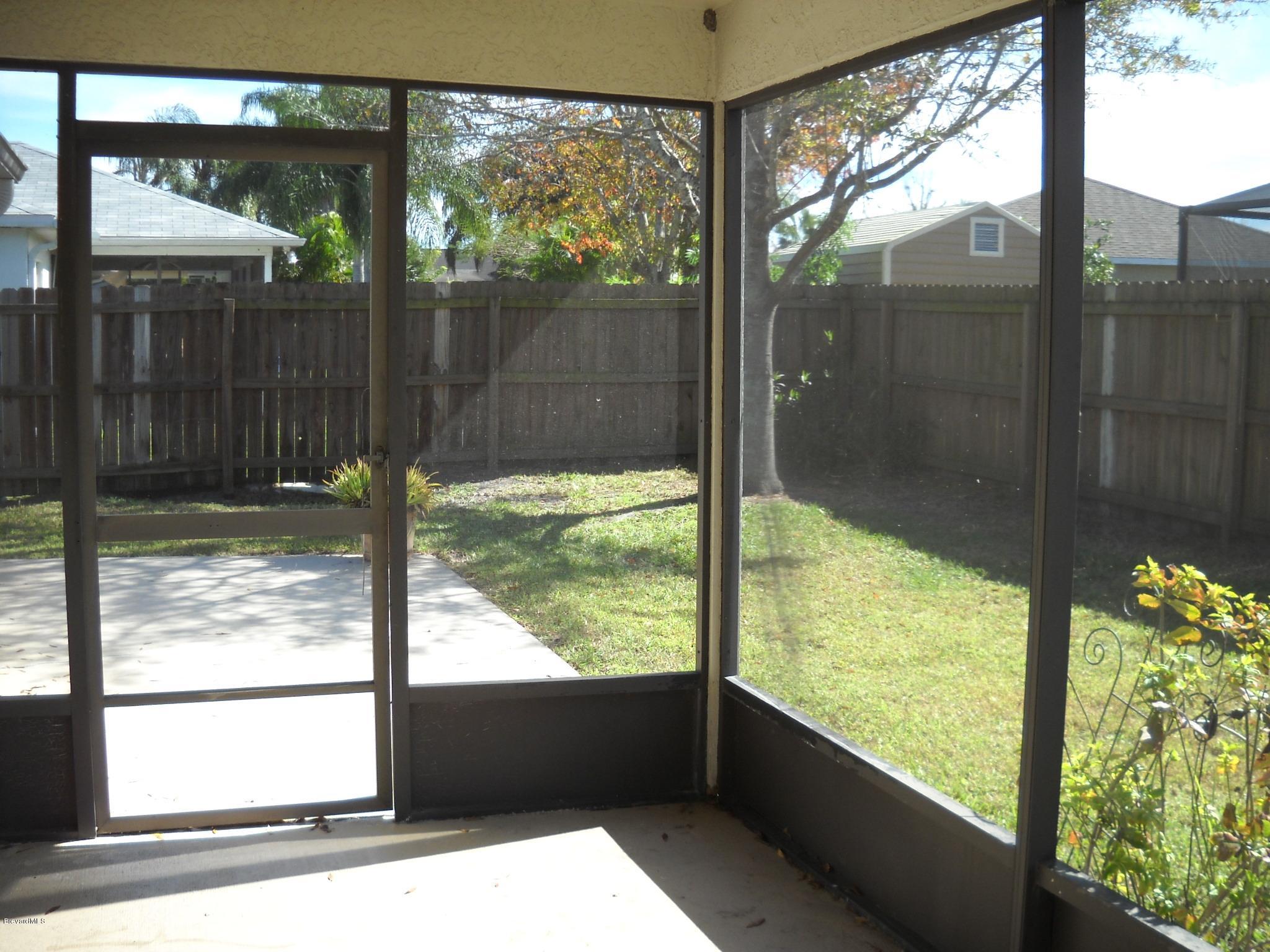 813 Gardener Road Rockledge, FL 32955 - Photo 16 of 21 Screened porch view