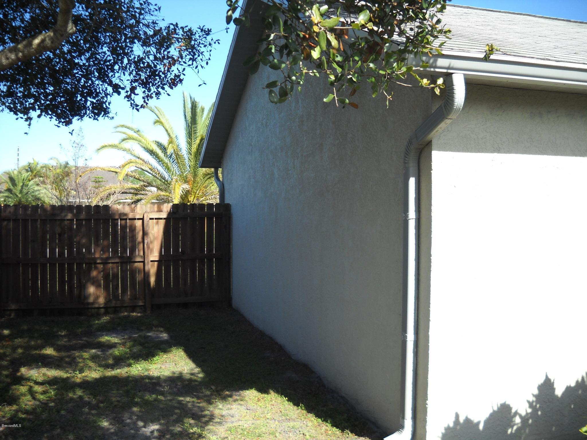 813 Gardener Road Rockledge, FL 32955 - Photo 19 of 21 Right side from the rear