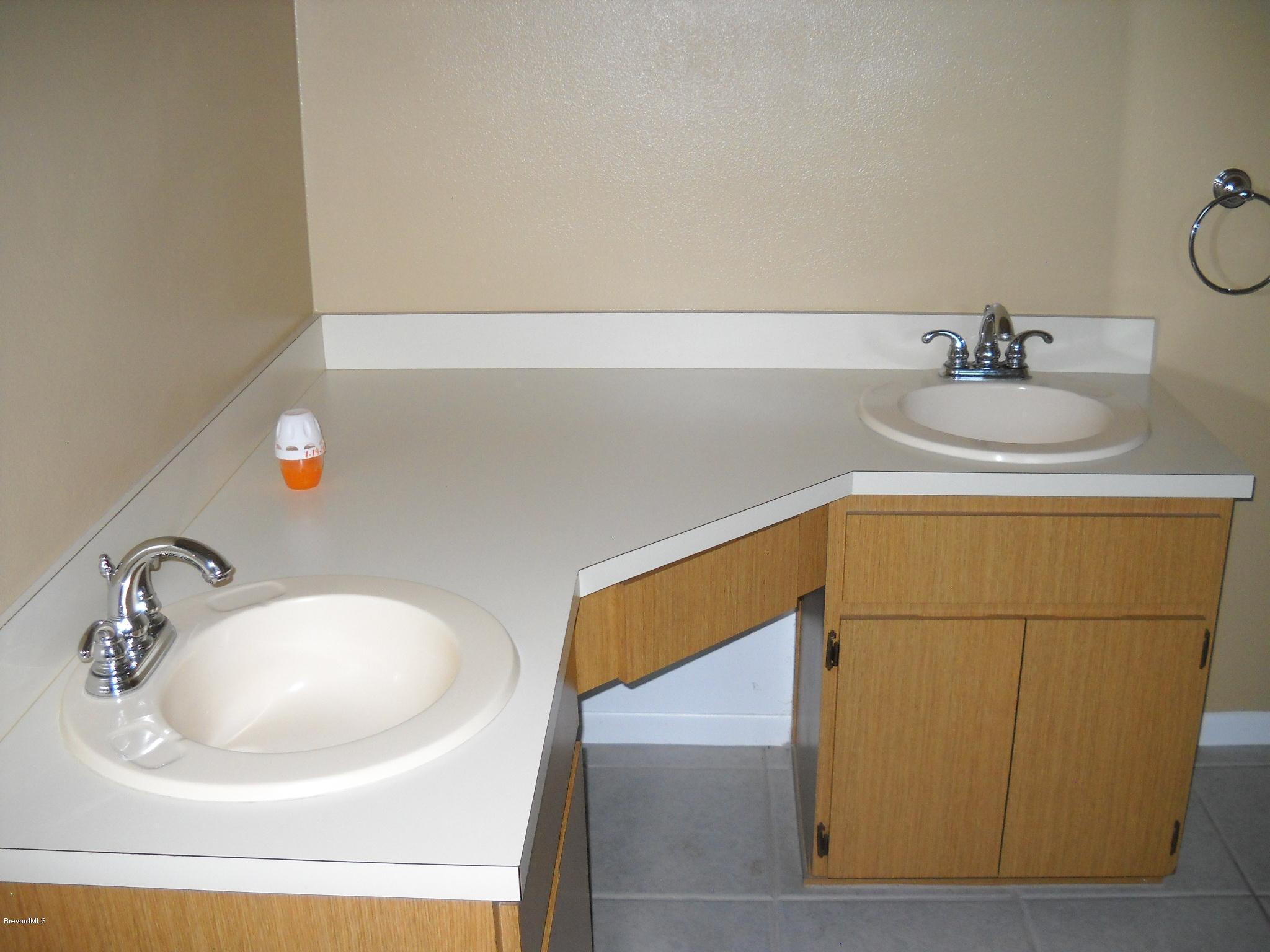 813 Gardener Road Rockledge, FL 32955 - Photo 9 of 21 Master bath with double sinks
