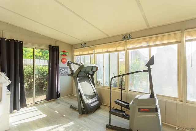 a view of a room with gym equipment
