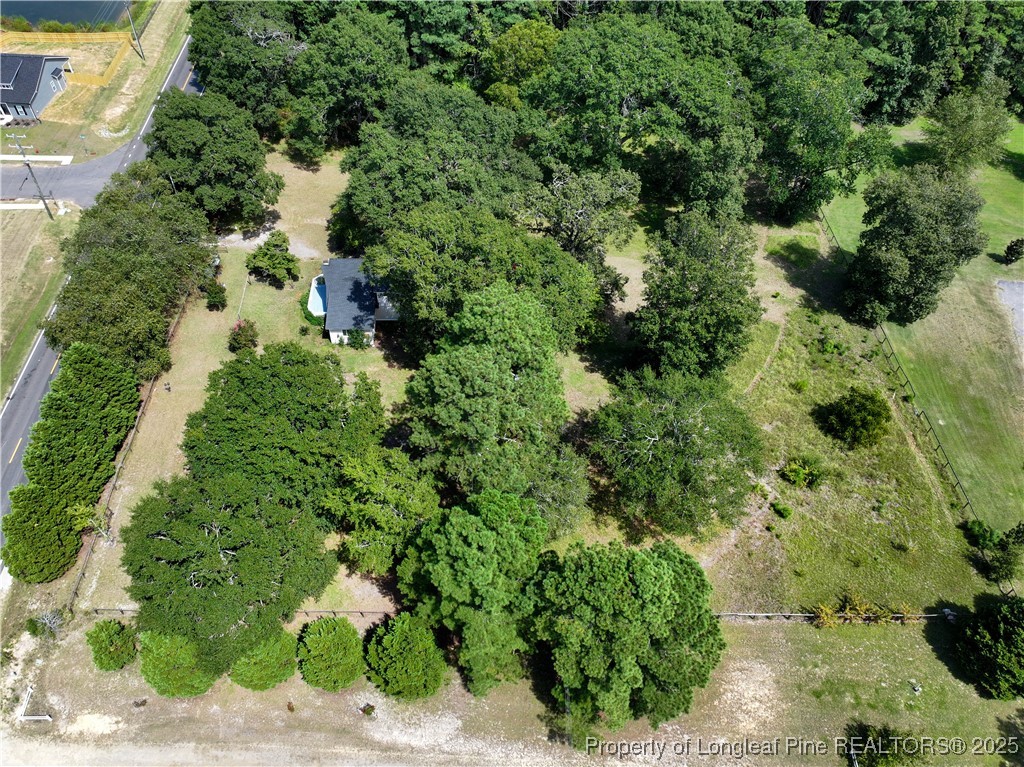 2135 Turnpike Road Raeford, NC 28376 - Photo 14 of 48 an aerial view of a house with a yard