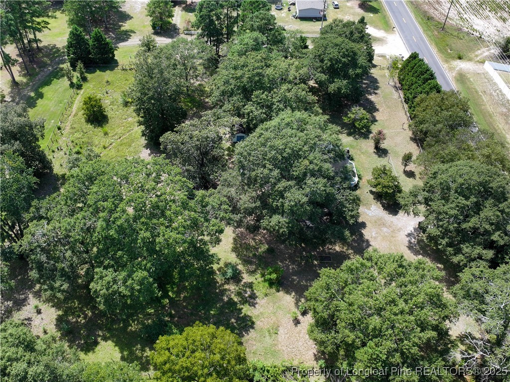 2135 Turnpike Road Raeford, NC 28376 - Photo 16 of 48 an aerial view of a house with a yard