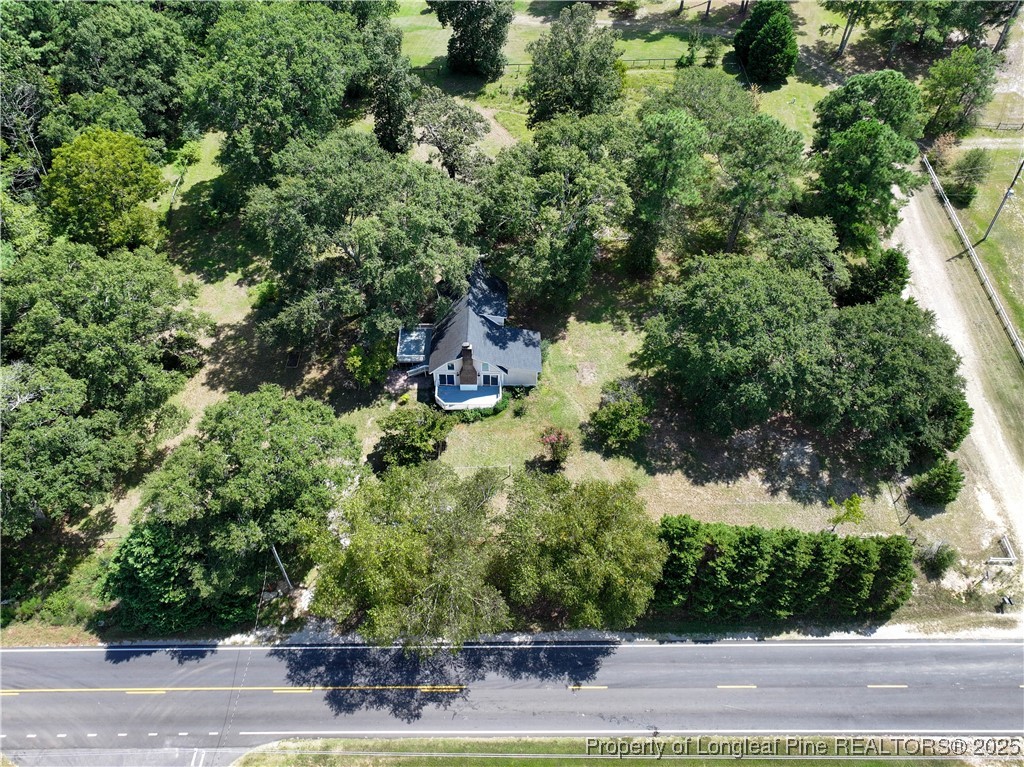 2135 Turnpike Road Raeford, NC 28376 - Photo 17 of 48 an aerial view of a house with yard