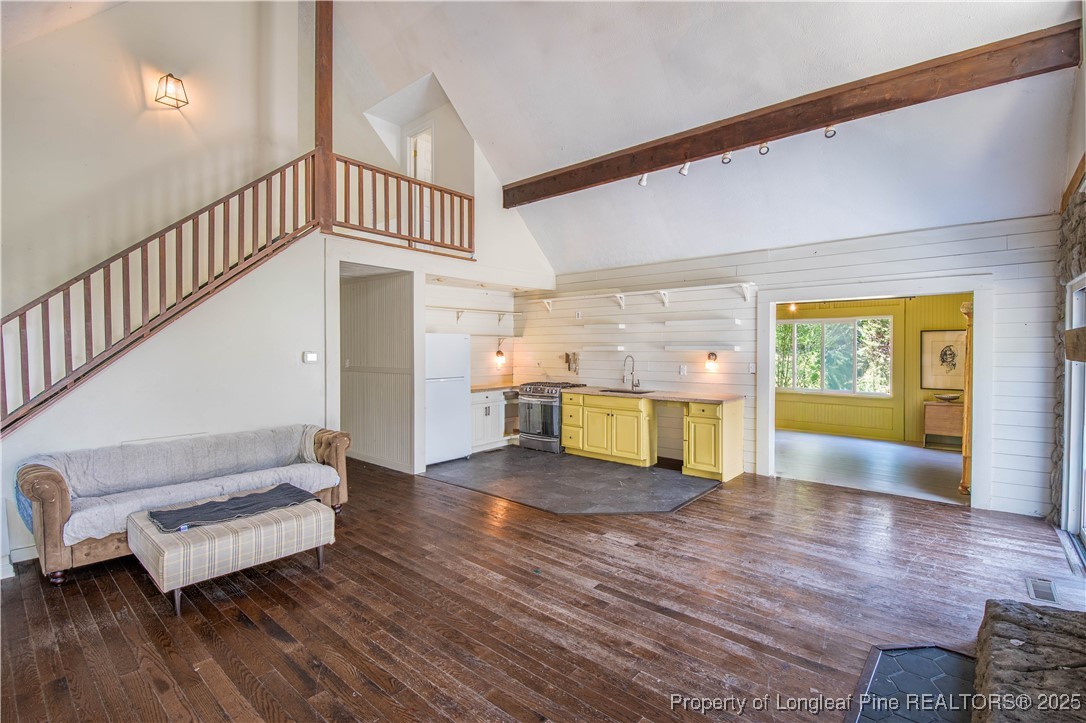 2135 Turnpike Road Raeford, NC 28376 - Photo 21 of 48 a view of an empty room with wooden floor