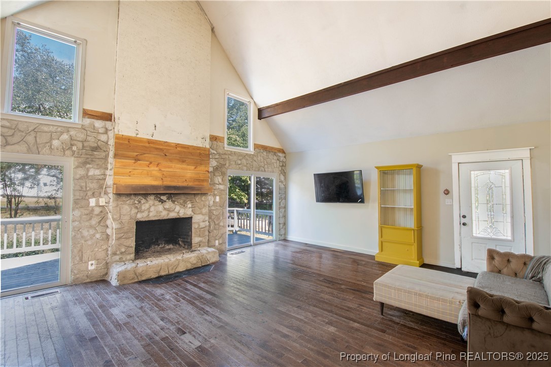 2135 Turnpike Road Raeford, NC 28376 - Photo 26 of 48 a living room with furniture and a fireplace