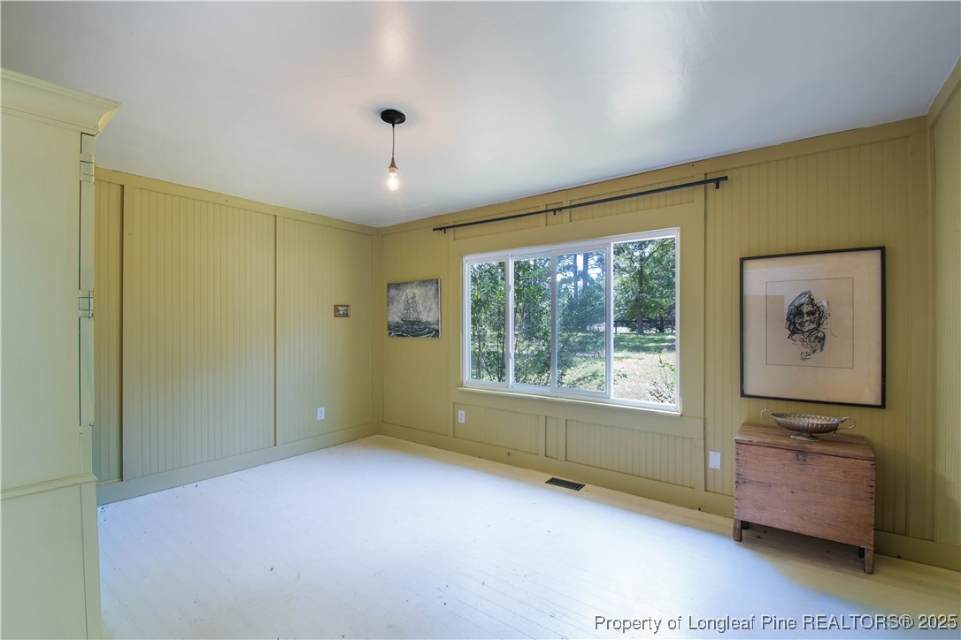 2135 Turnpike Road Raeford, NC 28376 - Photo 28 of 48 a view of an empty room with a window