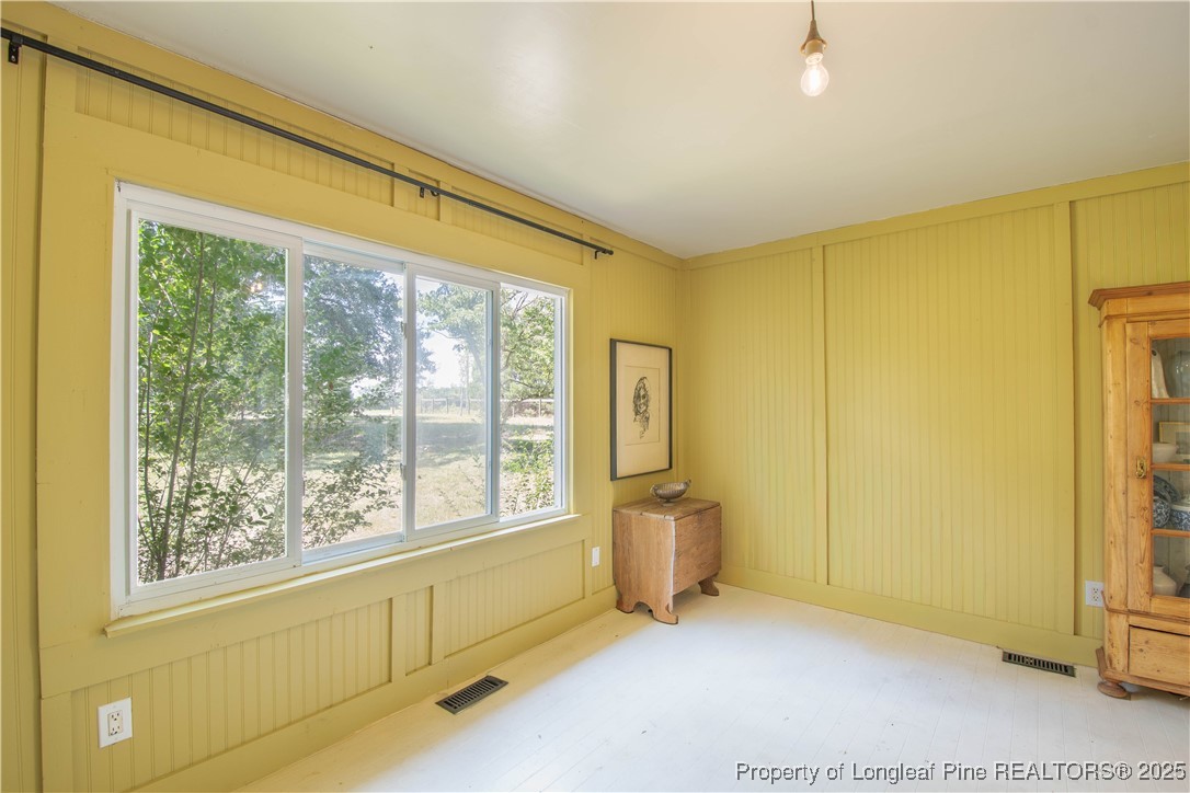 2135 Turnpike Road Raeford, NC 28376 - Photo 31 of 48 a view of an empty room with a window