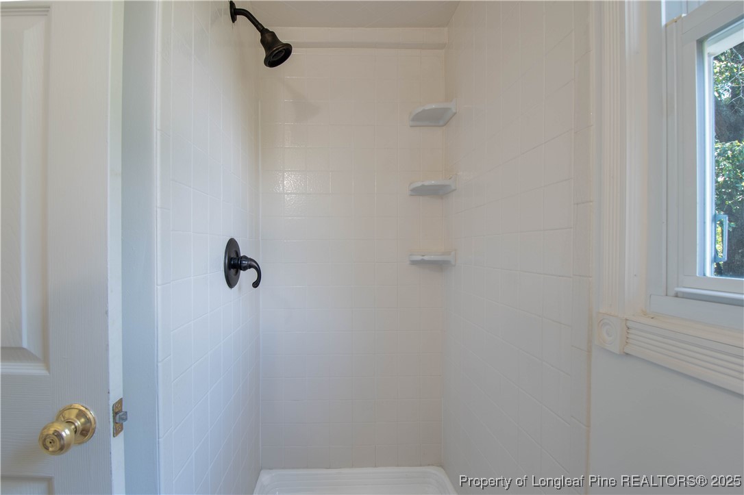2135 Turnpike Road Raeford, NC 28376 - Photo 40 of 48 a bathroom with a shower