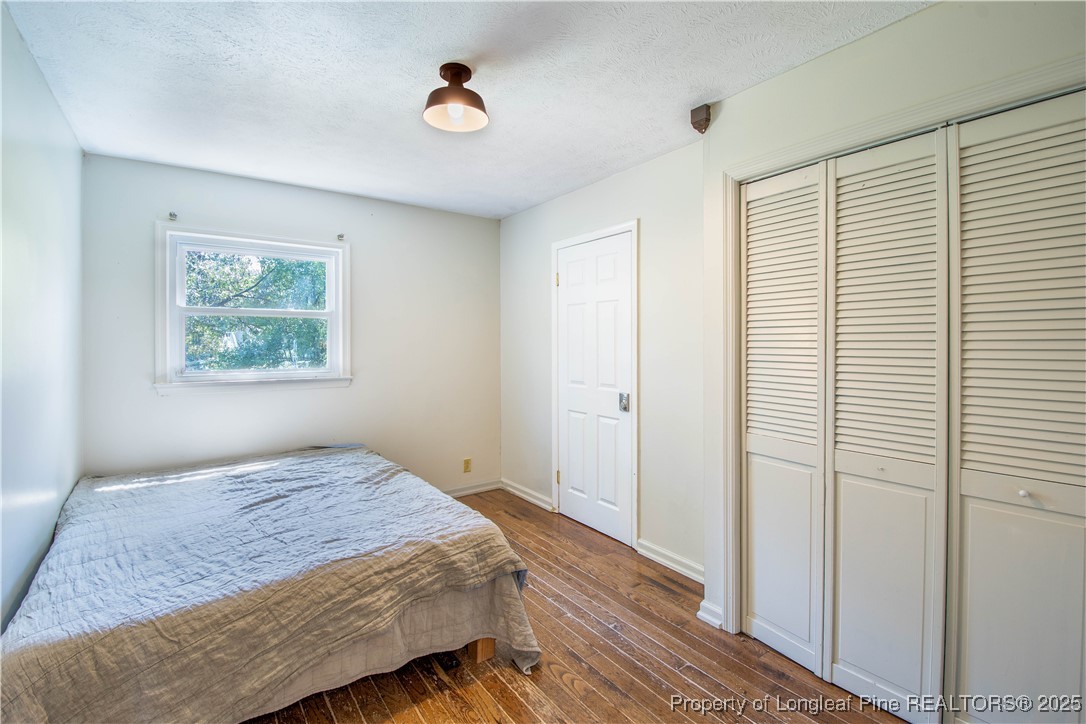 2135 Turnpike Road Raeford, NC 28376 - Photo 41 of 48 a bedroom with a bed and a window