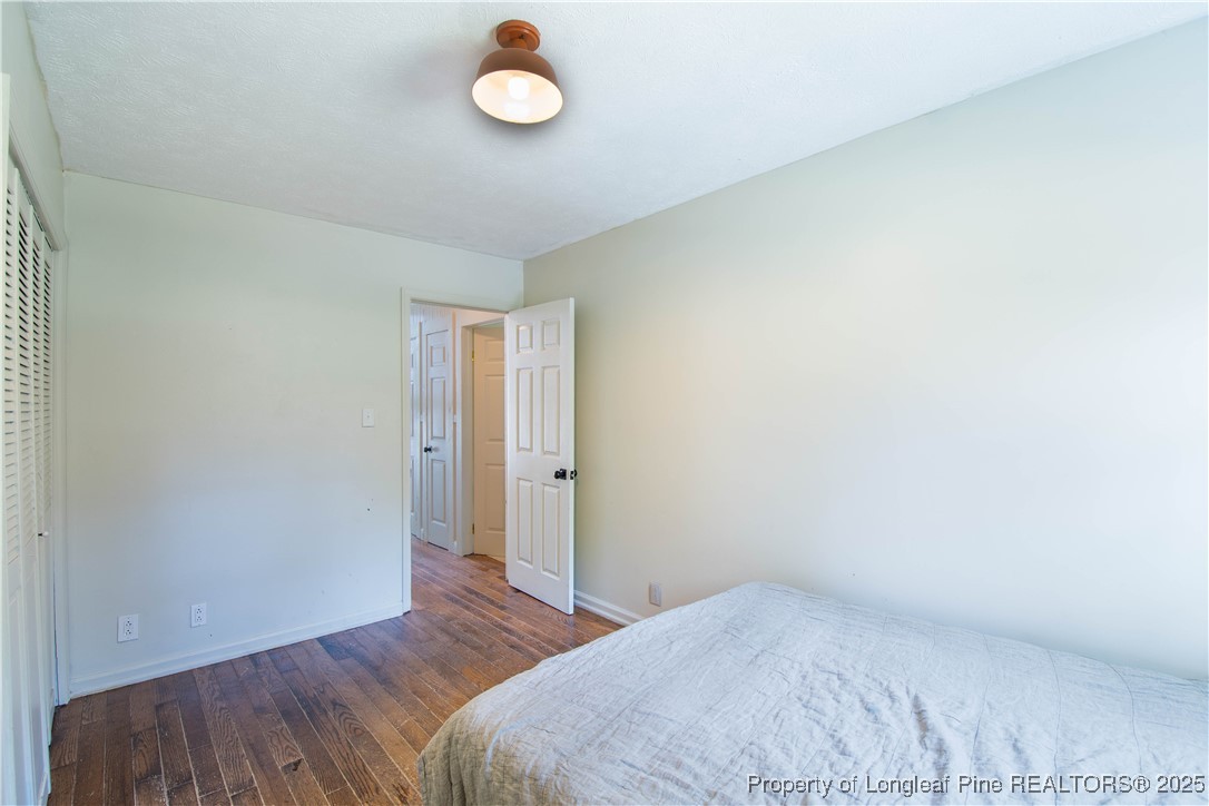 2135 Turnpike Road Raeford, NC 28376 - Photo 43 of 48 a view of a room with wooden floor and bathroom