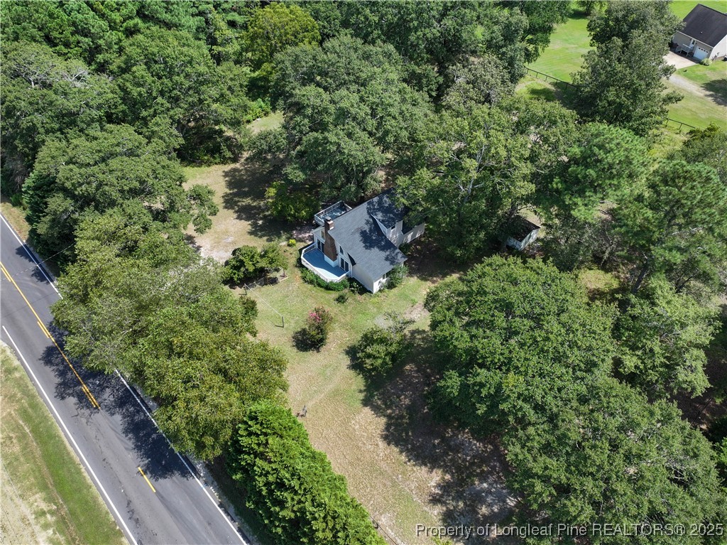 2135 Turnpike Road Raeford, NC 28376 - Photo 8 of 48 an aerial view of residential house with outdoor space