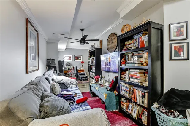 a walk in closet with a mirror