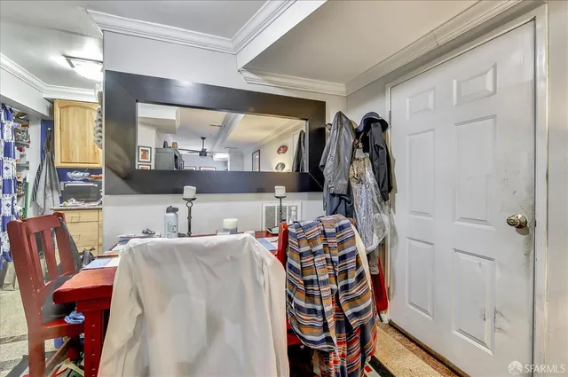 a bathroom with a granite countertop sink a toilet a mirror and bathtub