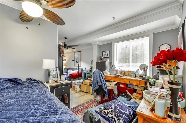 a picture of a bench in front of a building