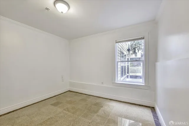 a view of balcony with wooden floor