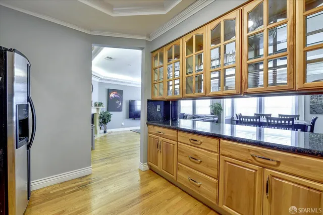 a view of an entryway with wooden floors