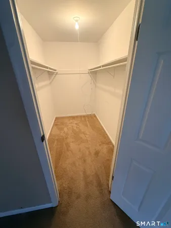 view of an empty room with wooden floor