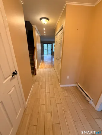a view of hallway with stairs