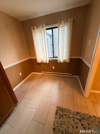 a view of a room with a window