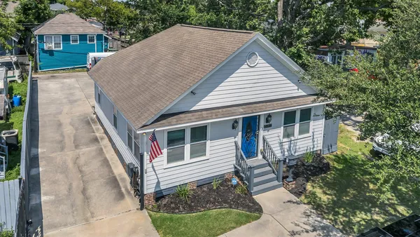 a house view with a garden space