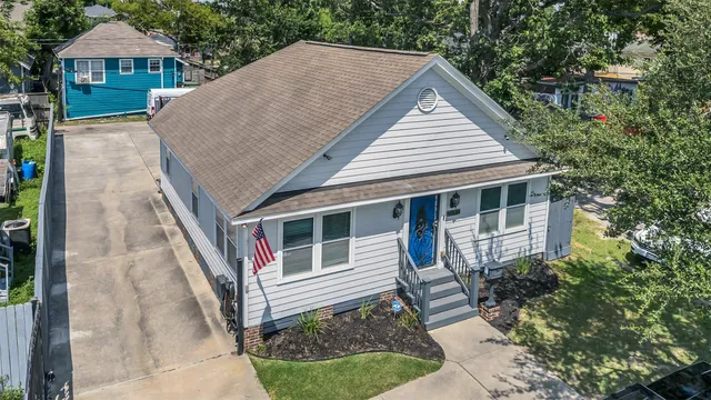 a house view with a garden space
