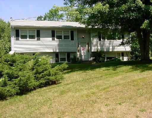 5 Royal Road Danbury, CT 06811 - Photo 1 of 1 a front view of a house with a yard
