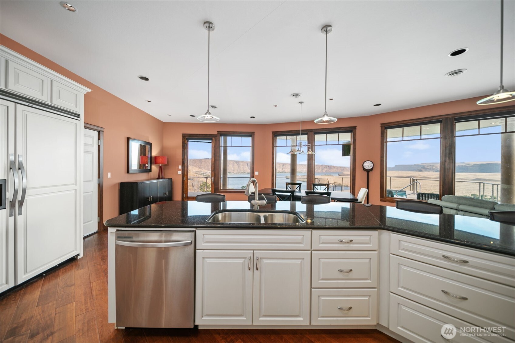 25 Mansfield Road Quincy, WA 98848 - Photo 17 of 40 a kitchen with counter top space cabinets and appliances