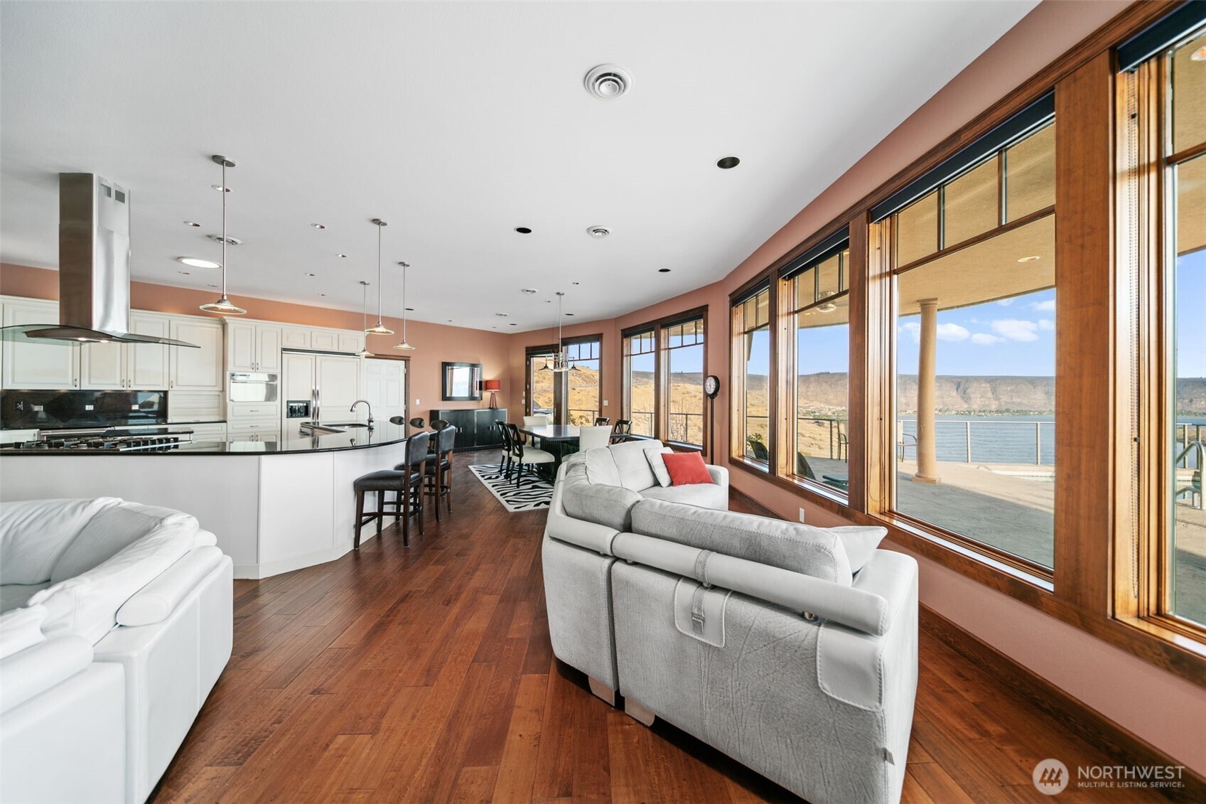 25 Mansfield Road Quincy, WA 98848 - Photo 22 of 40 a living room with furniture a large window and wooden floor
