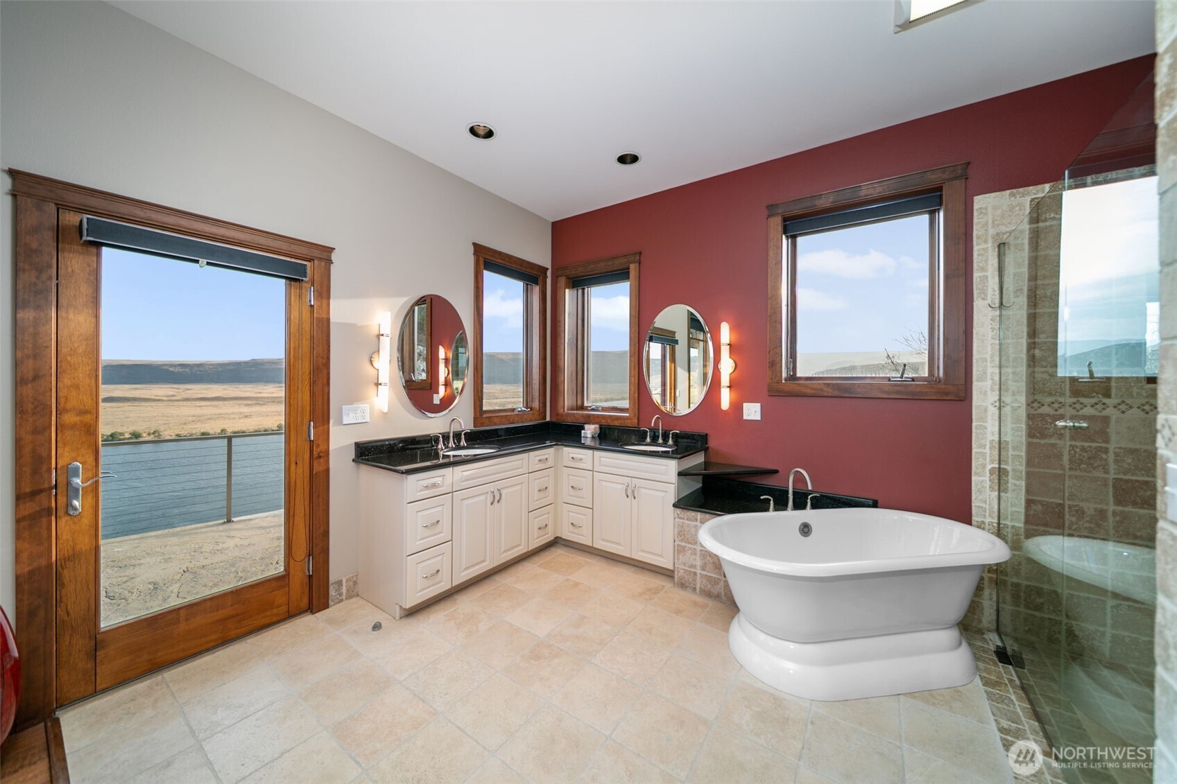 25 Mansfield Road Quincy, WA 98848 - Photo 29 of 40 a bathroom with a double vanity sink a mirror and a shower