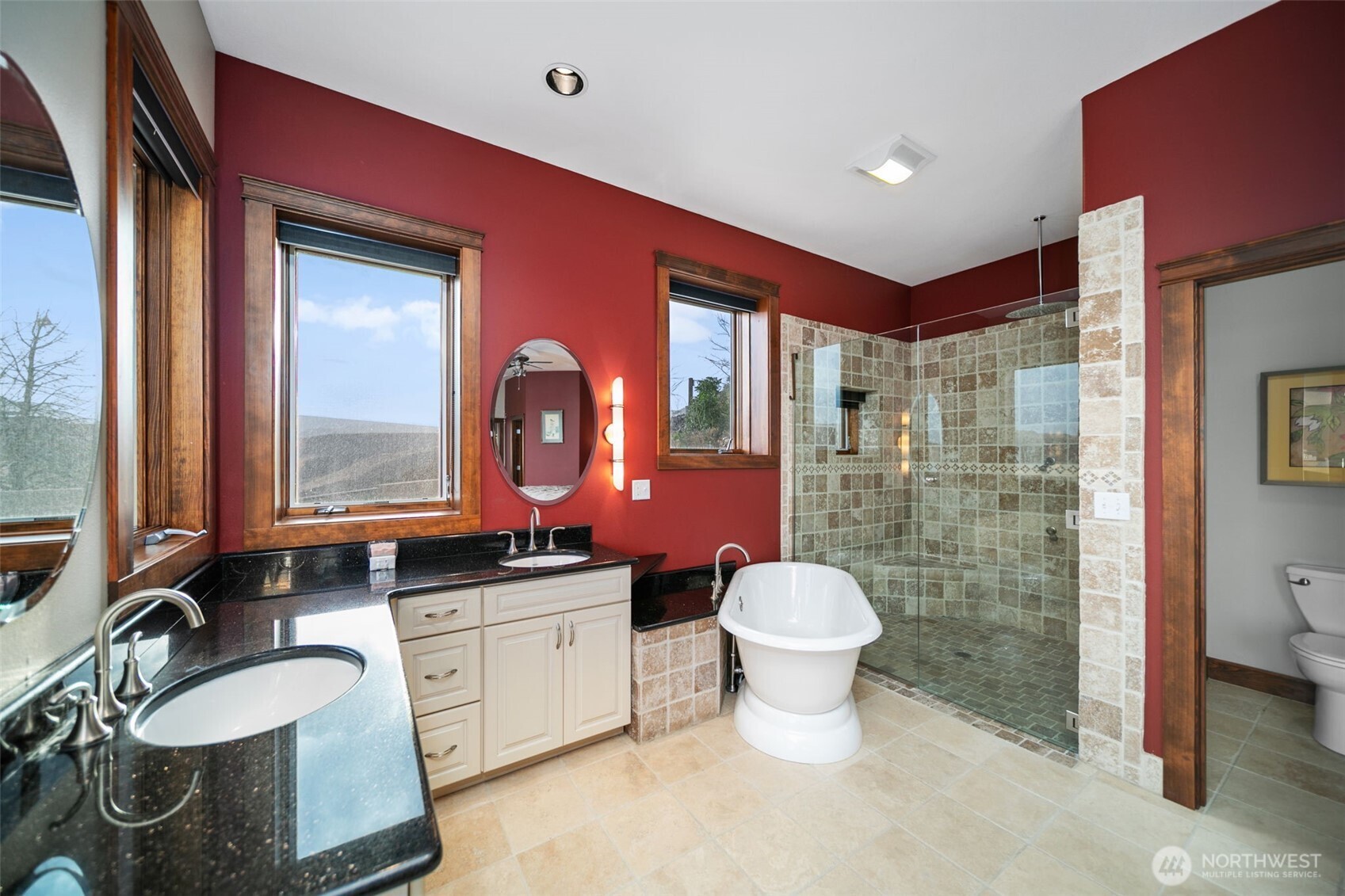 25 Mansfield Road Quincy, WA 98848 - Photo 31 of 40 a bathroom with a granite countertop toilet a sink and a mirror