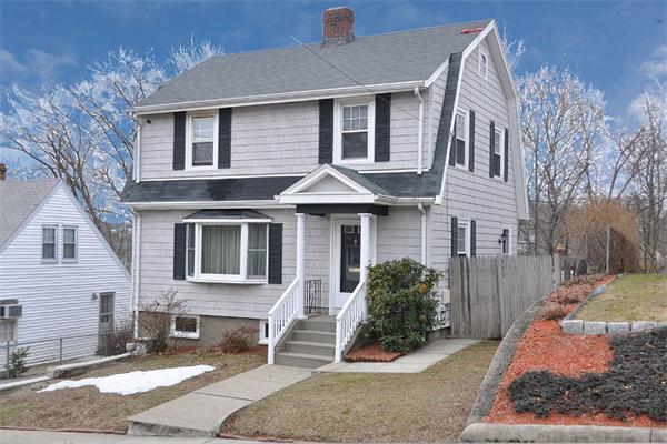 24 Overlook Road Arlington, MA 02474 - Photo 1 of 18 a front view of a house with a yard