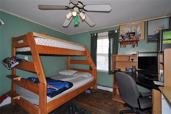 24 Overlook Road Arlington, MA 02474 - Photo 12 of 18 a bedroom with a bed and wooden floor