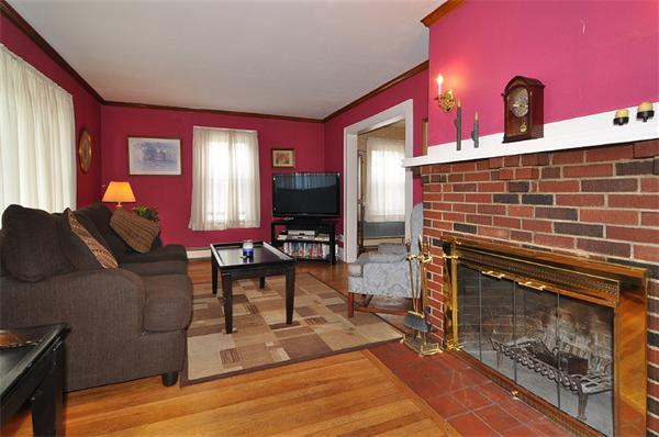 24 Overlook Road Arlington, MA 02474 - Photo 4 of 18 a living room with furniture a window and red fireplace