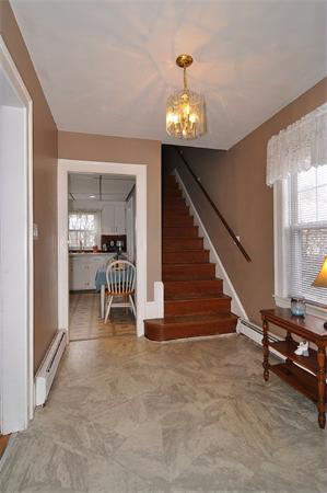 24 Overlook Road Arlington, MA 02474 - Photo 9 of 18 a view of livingroom with furniture and staircase
