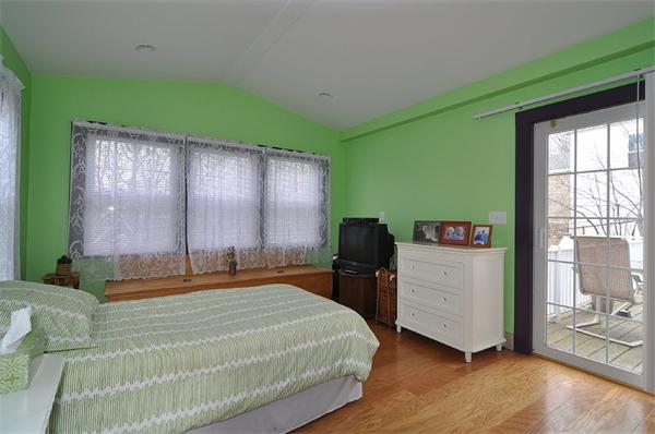 24 Overlook Road Arlington, MA 02474 - Photo 10 of 18 a bedroom with a bed and a window