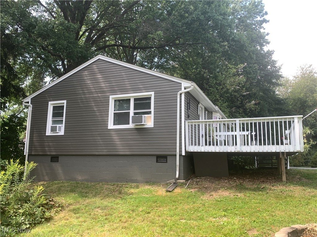 1714 Woods Road Akron, OH 44306 - Photo 3 of 28 side view, new vinyl siding, roof, gutter guards